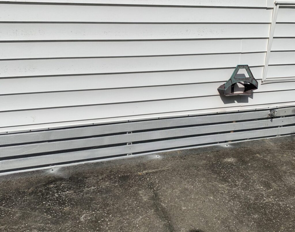 Clearwater mobile home sealed with hardware cloth and soffit repair to prevent rats and raccoons from entering attic spaces.