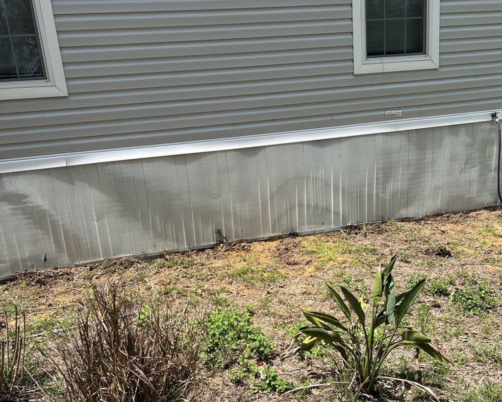 Mobile home in Floral City FL with ¼-inch hardware cloth barrier and sealed soffits to stop attic and crawl space wildlife entry.