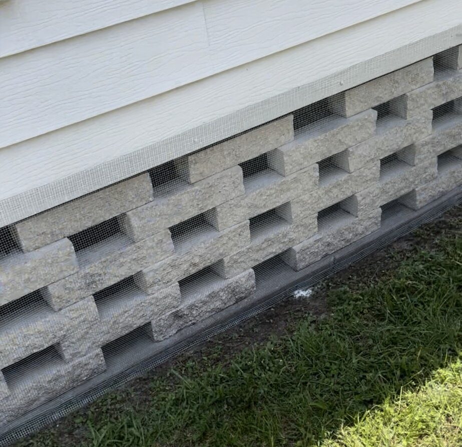 Moon Lake mobile home with hardware cloth barrier (buried or concrete‑mounted), sealed soffits and attic vents, and optional interior wrap.